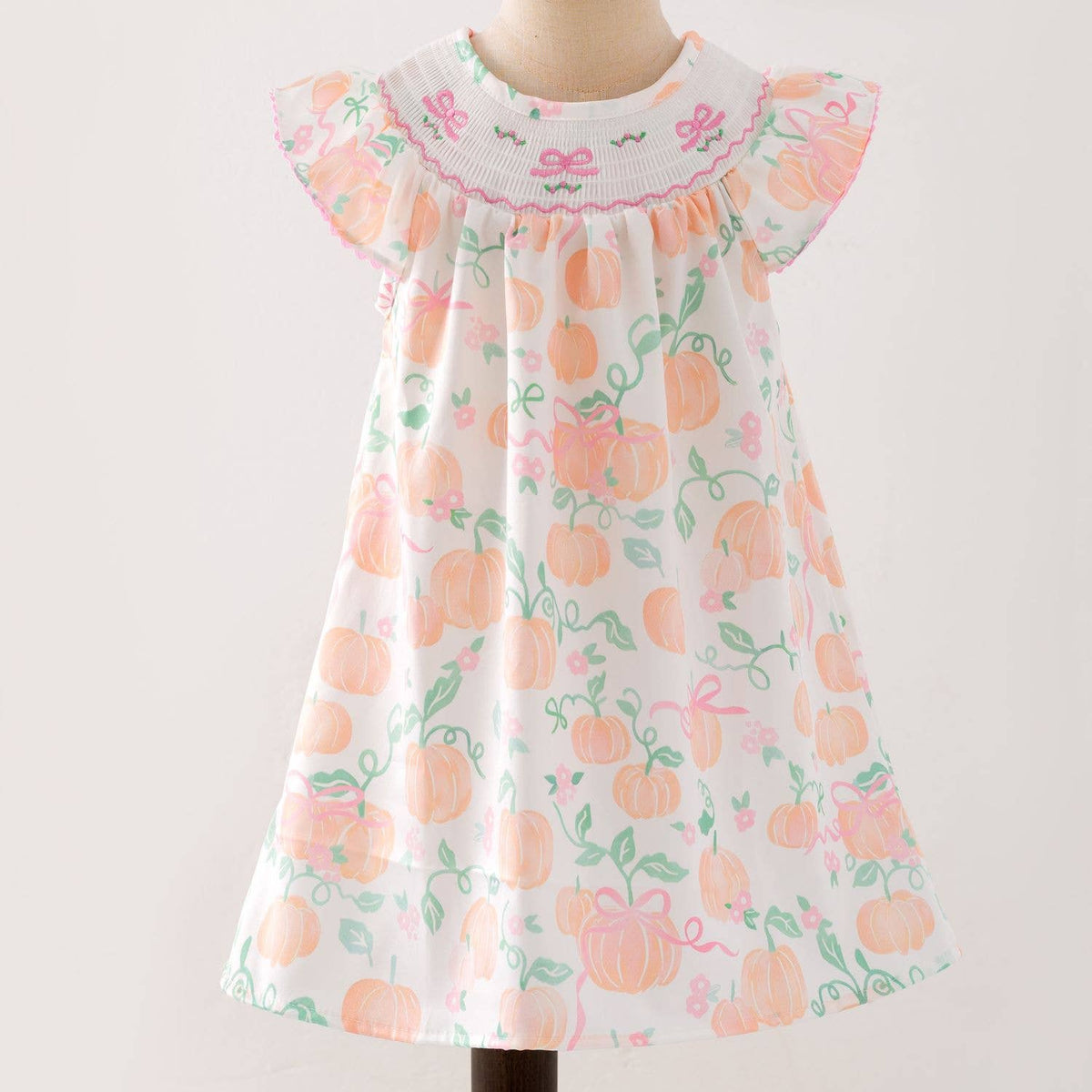 Peachy Pumpkin Smocked Girls Dress