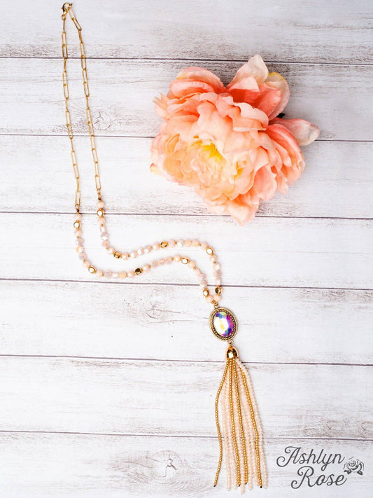 Crash My Party Oval Iridescent Crystal Beaded Tassel Pendant on a Crystal Beaded Gold Linked Chain Necklace, White